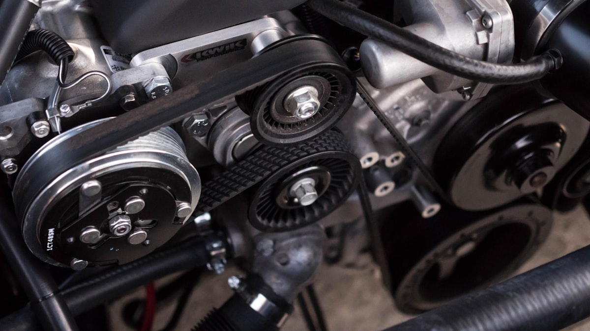 Close-up of an automotive engine with belt drive