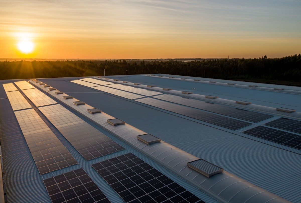 Rooftop solar installation at sunset